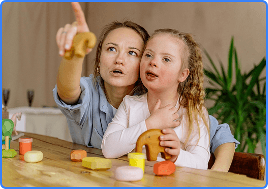MacBook mockup showing Nurse Aid in-home support — a carer and participant learning together